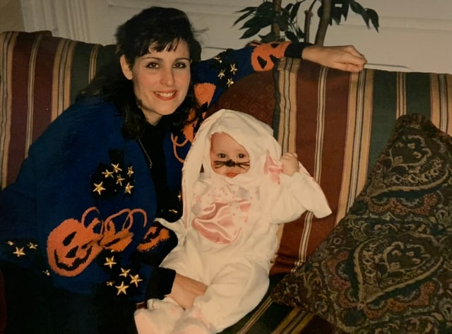 Ruby holding Kaitlin as a baby.